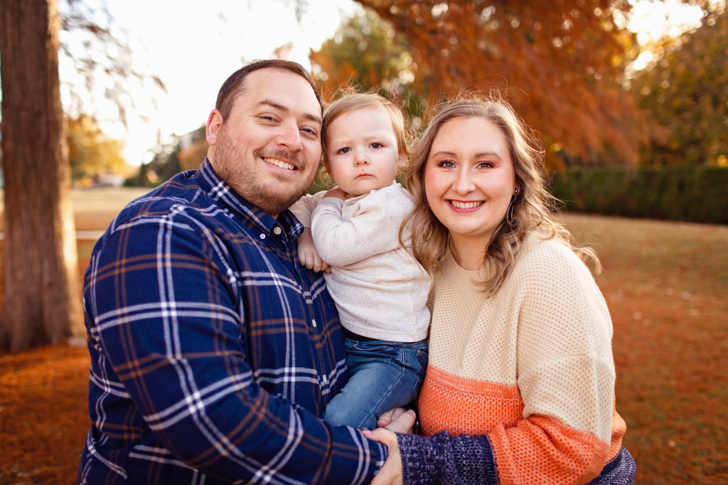 man, womand and toddler